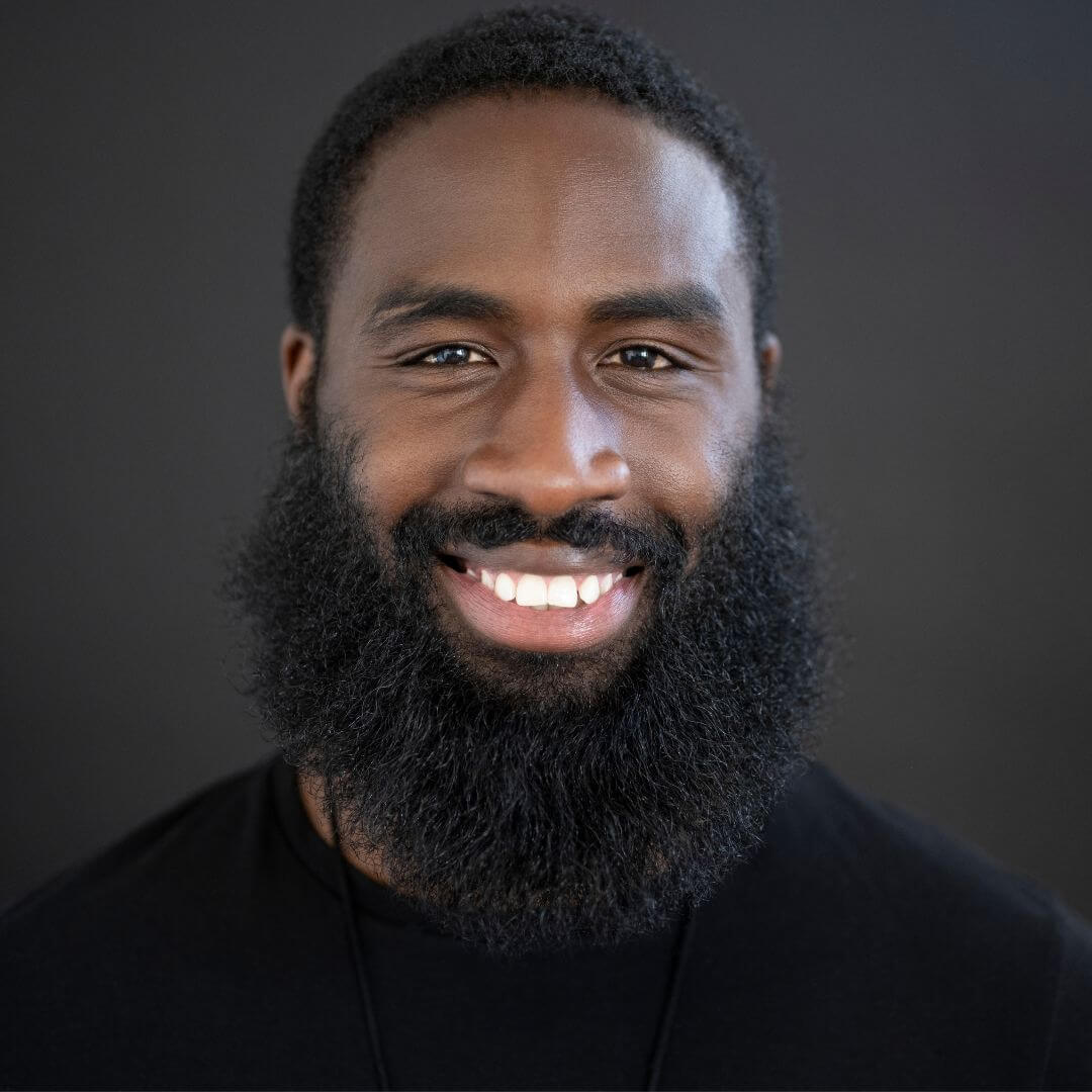 smiling bearded man