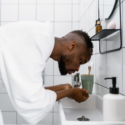 a man washing his beard