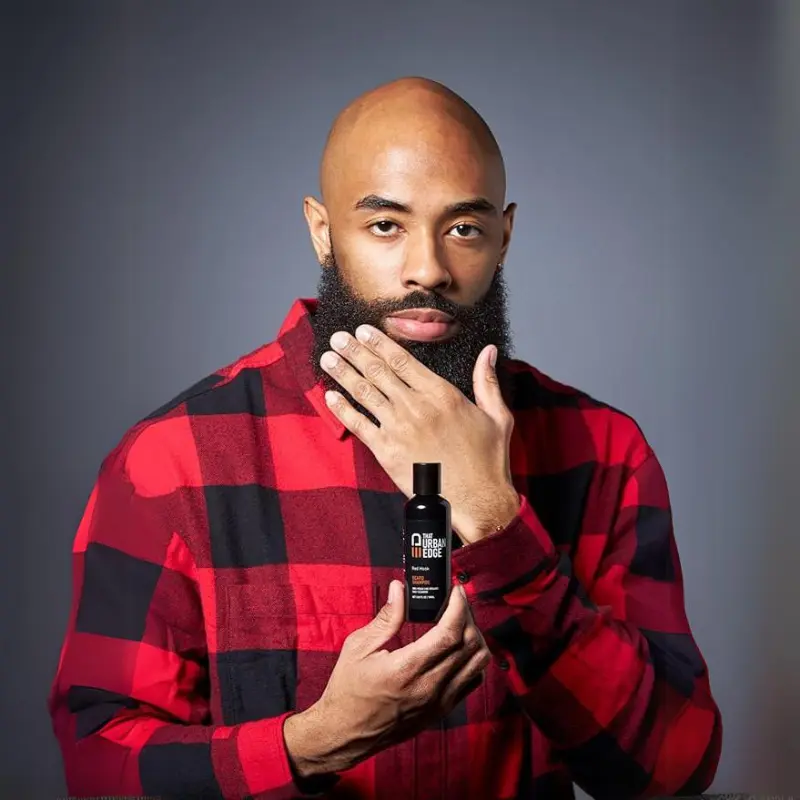 Black Man Holding That Urban Edge Beard Shampoo