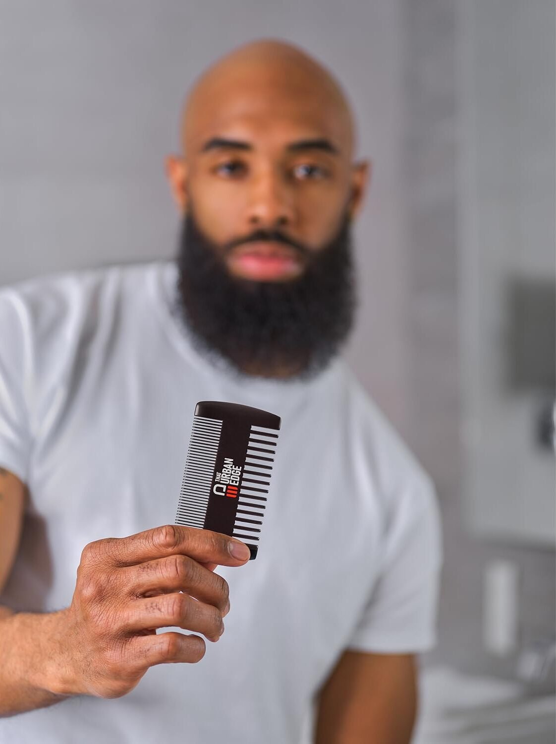 Model Holding Beard Comb
